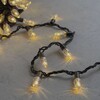 Миниатюра фото гирлянда «шишки» 10м тепло-белая 220в, 100 led, провод черный каучук 2,3мм, ip65 ltc cn100-2-2ww | 220svet.ru